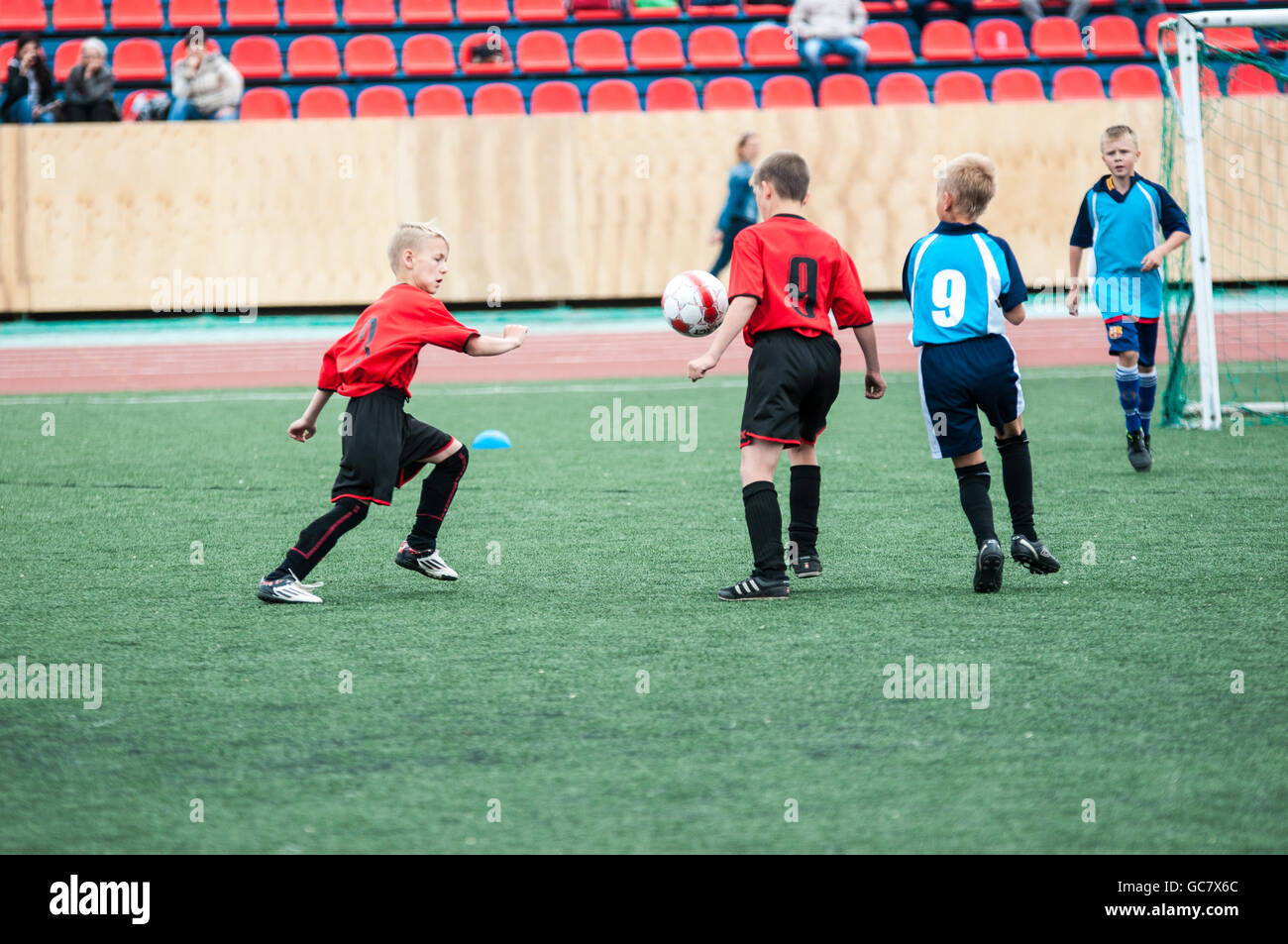 Orenburg, Russia - 1 June 2016: The boys play football in the preliminary games football festival 'Lokobol-2016' Stock Photo