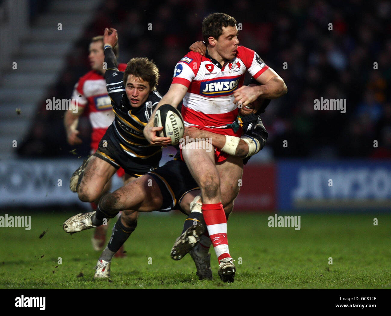Gloucester's Calum MacRae is tackled by Worcester's Dale Rasmussen during the Guinness Premiership match at Kingsholm, Gloucester. Stock Photo