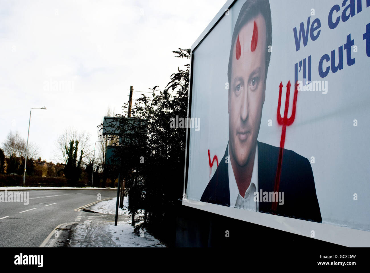 Graffiti on a Conservative Party poster on Radcliffe Road, West Bridgford, Nottingham a day after the poster had been in place. Stock Photo