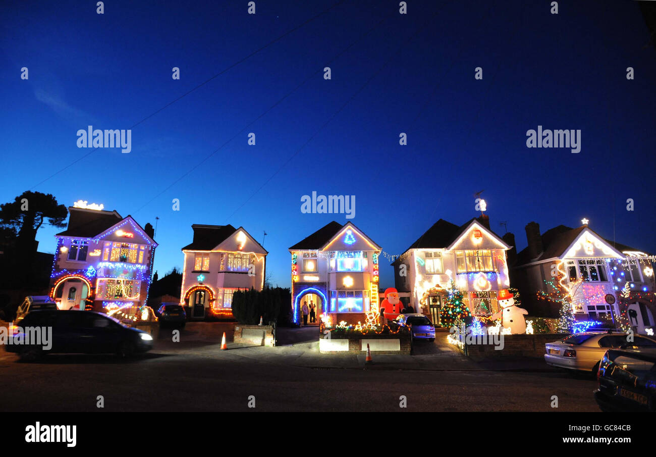 Runton Road in Branksome, Dorset - a quiet seaside cul-de-sac - has become something of a Christmas attraction as neighbours try to out-do each other with their festive lights. Stock Photo