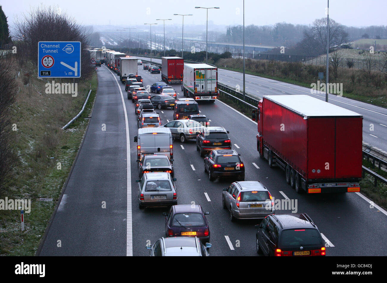 Stationary traffic on the M20 near Folkestone in Kent as heavy snow in northern France overnight causes travel chaos. Stock Photo