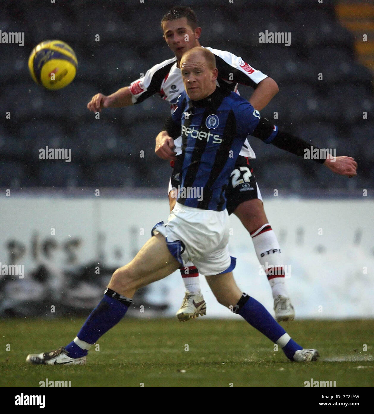 Soccer - Coca-Cola League Two - Rochdale v Shrewsbury Town - Spotland. Shrewsburys Waide Fairhurst and Rochdale's Jason Kennedy in action during the Coca-Cola League Two match at Spotland, Rochdale. Stock Photo