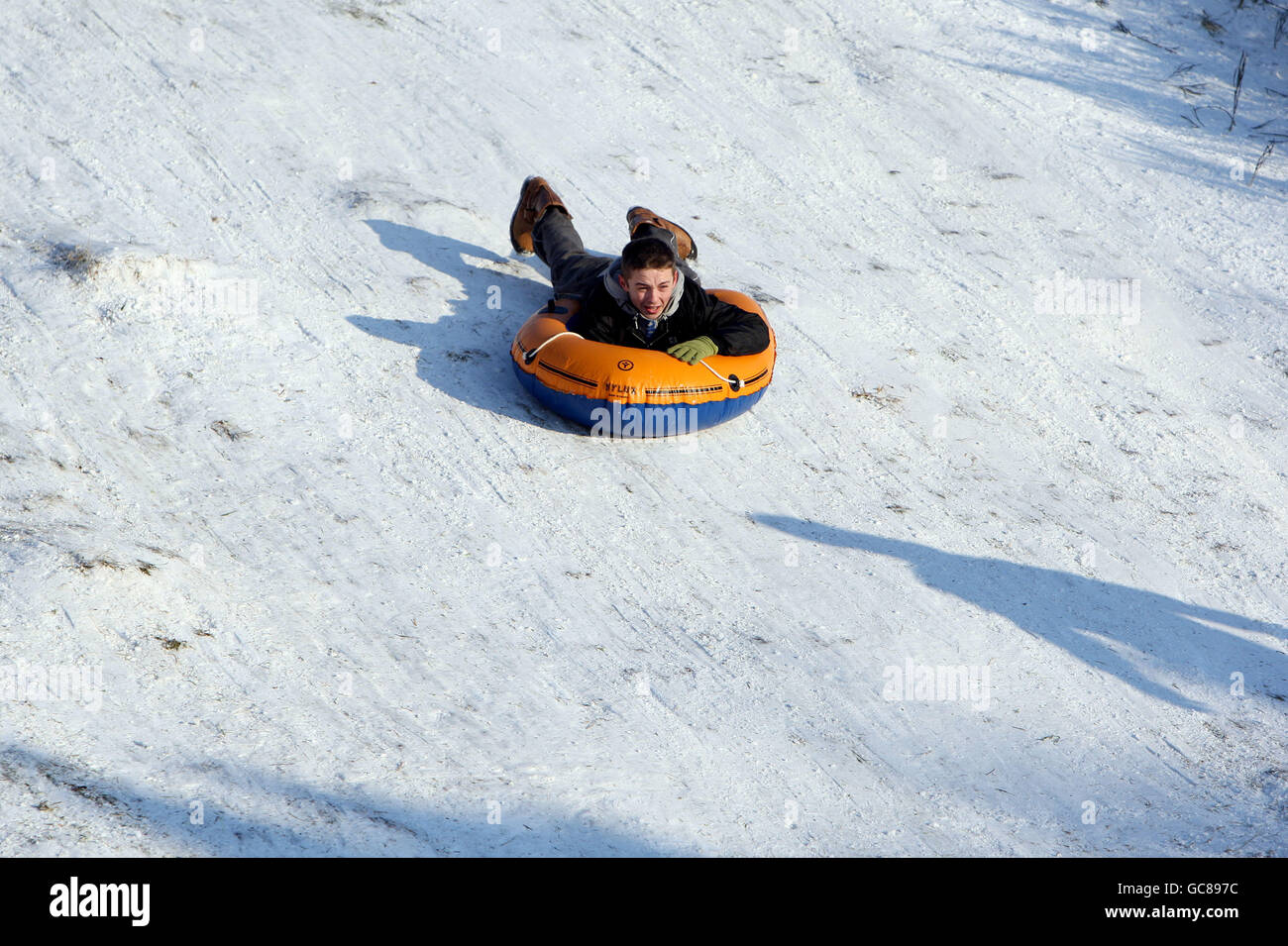 Kids use alternative means for sledges on Mousehold Heath, Norwich