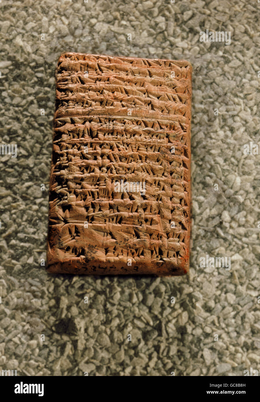 writing, scripture, cuneiform writing, Neo-Assyrian, sales contract for a femal slave, clay tablet, Nimrud, post 648 BC, Iraqi National Museum, Bagdad, ancient world, antiquity, Mesopotamia, Assyria, Neo - Assyrian, document, trade, slavery, historic, historical, ancient world, Additional-Rights-Clearences-Not Available Stock Photo