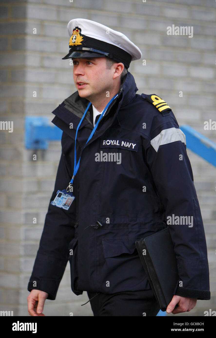 Royal Navy Lieutenant Commander Andrew Cutler leaves the Courts Martial