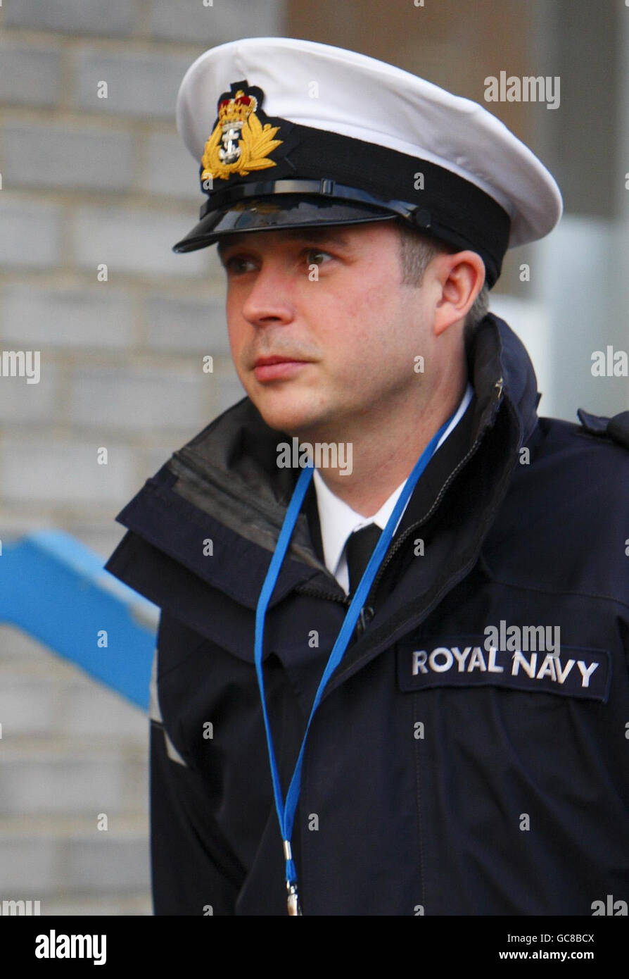 Royal Navy Lieutenant Commander Andrew Cutler leaves the Courts Martial
