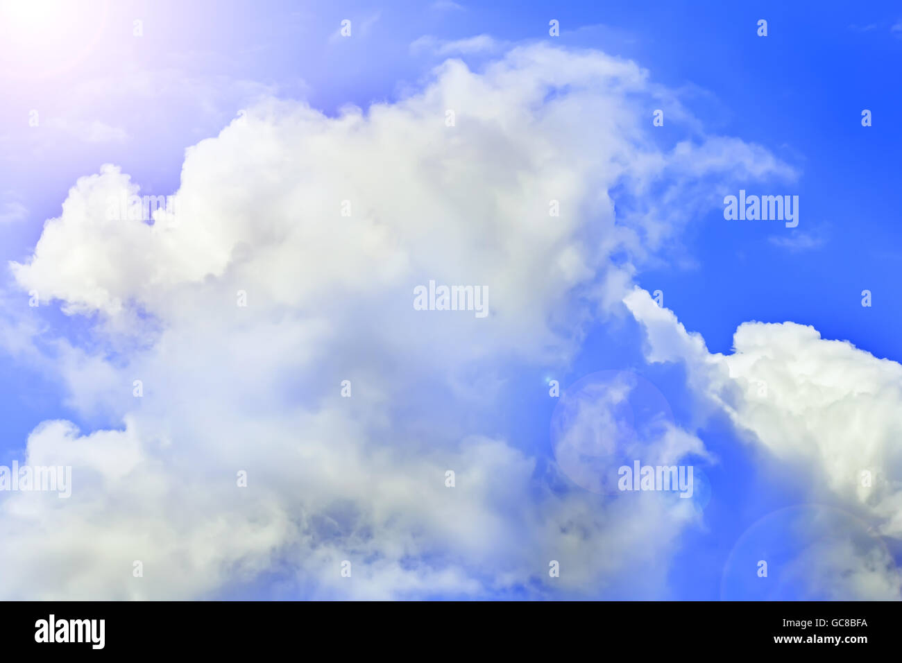 Nice happy white clouds in blue sunny sky Stock Photo