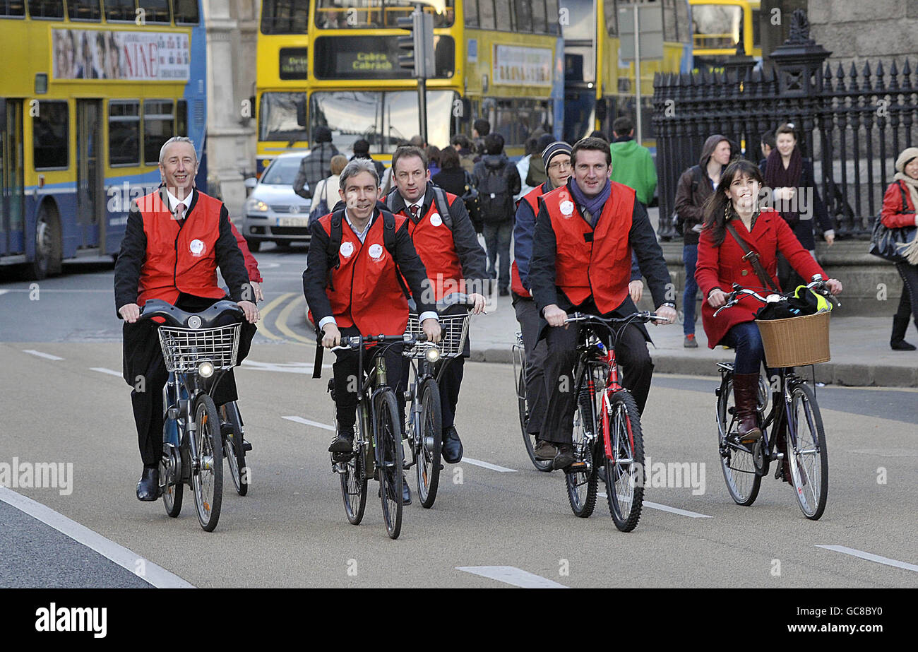 Labour Party members of Dublin City Council cycle past Trinity College