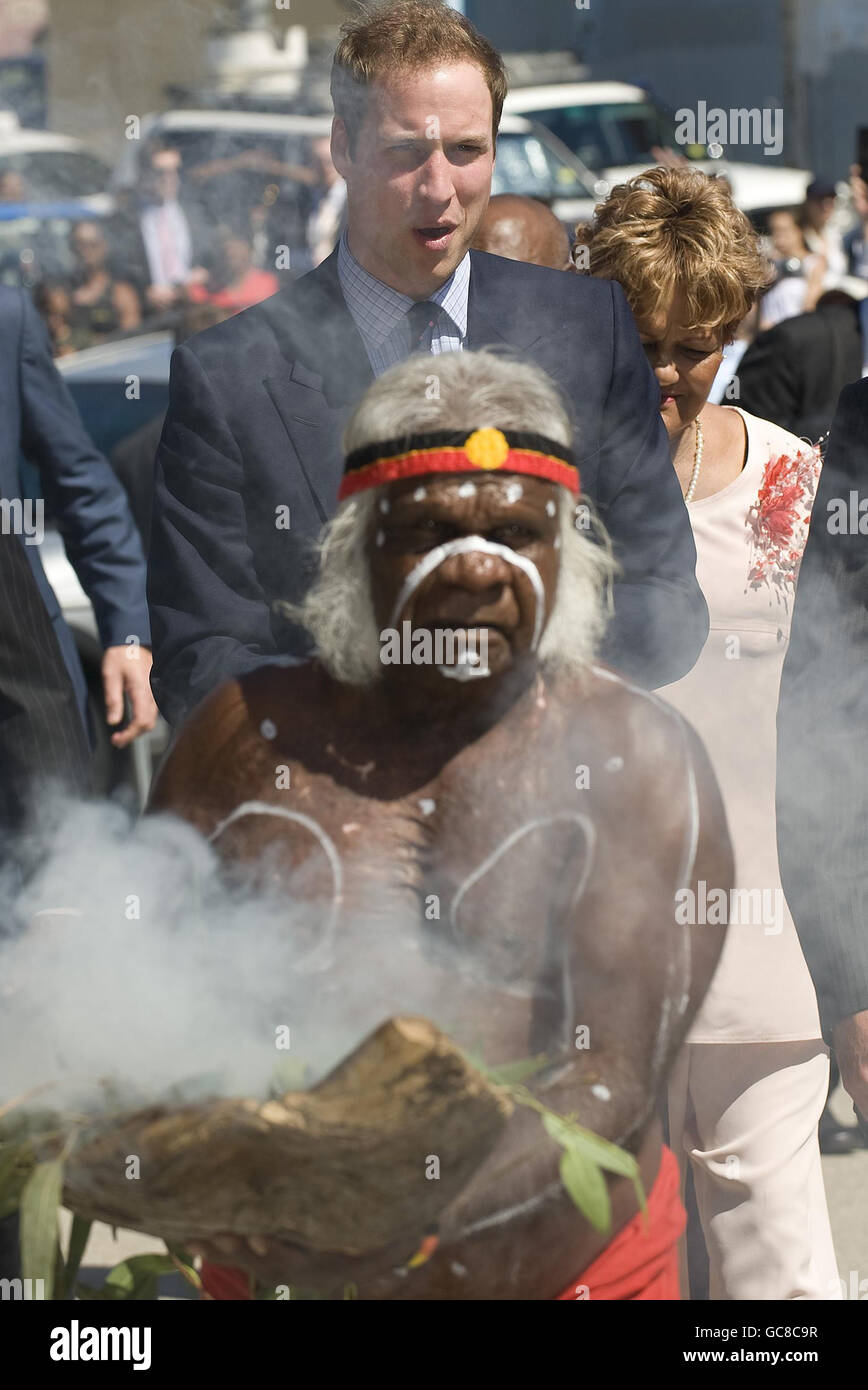 Prince William (top) arrives at the The Redfern Community Centre in Redfern, Sydney, where 'Uncle Max' - a local Aborigine - welcomed him with a traditional Smoke Ceremony. The Prince arrived in Sydney, Australia, today after flying in from New Zealand for an unofficial three day visit. Stock Photo