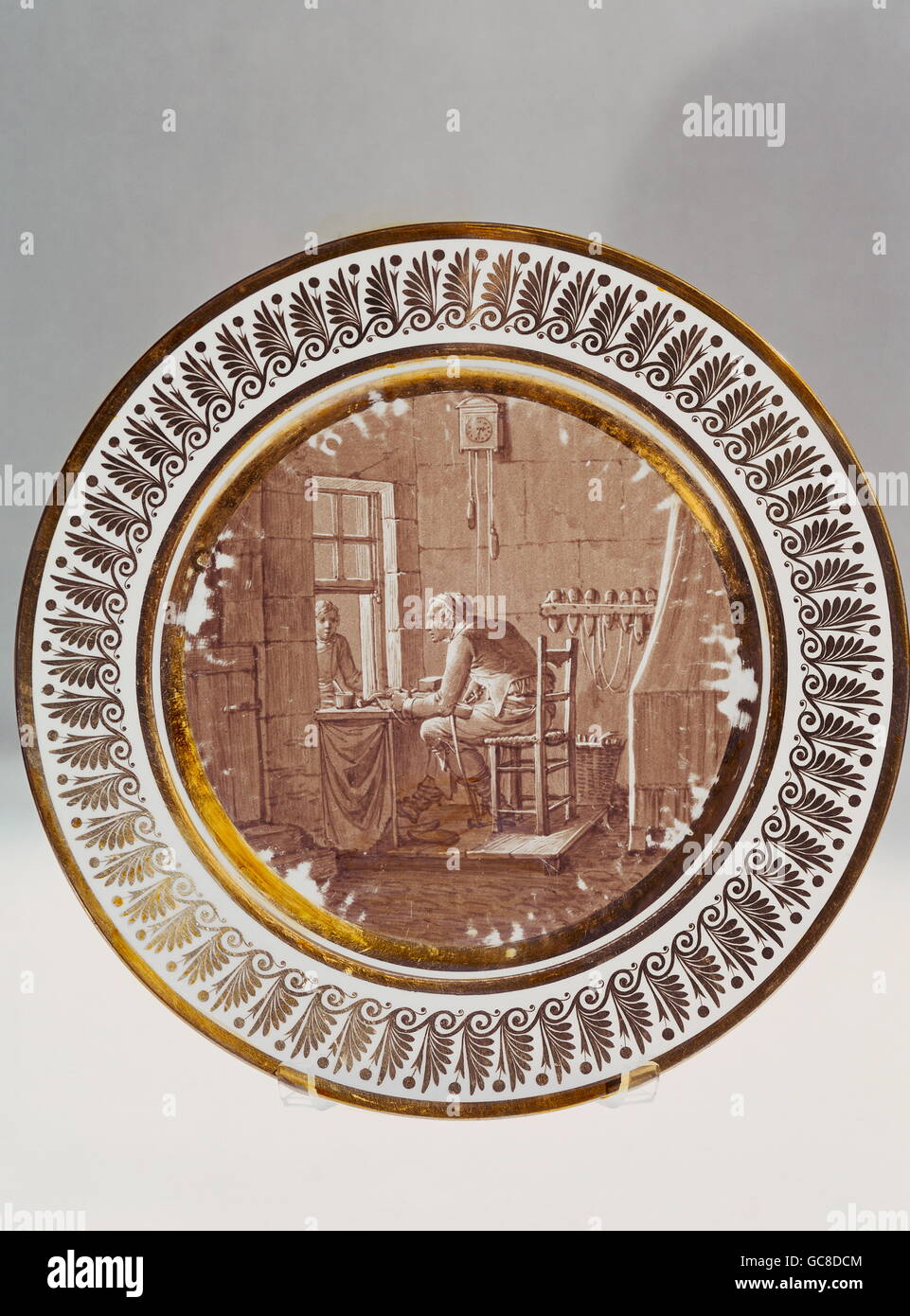 fine arts, porcelain, plate, painted, 'shoemaker workshop', from service 'campaigns and rural life', diameter 23,5 cm, Sevres Manufactory, 1806 / 1808, Stock Photo