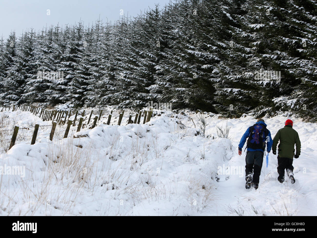 Keith Hollis Left With His Friend Name Not Given On His Way To Fly His Kiteduring The Festive Season Whilst High In The Hills Of The Carron Valley Central Scotland Stock Photo