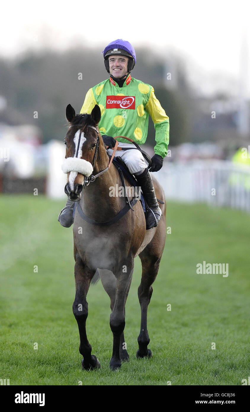 Jockey Ruby Walsh smiles after victory on Kauto Star in The William Hill King Georg VI Steeple Chase during the William Hill Winter Festival at Kempton Park Racecourse, Middlesex. Stock Photo