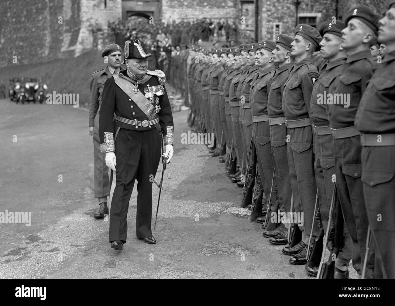 Winston Churchill inspects a guard of honour from the 4th Coast Training Regiment Royal Artillery at Dover Castle. Winston Churchill was appointed Lord Warden of the Cinque Ports by the Court of Shepway at Dover. Stock Photo