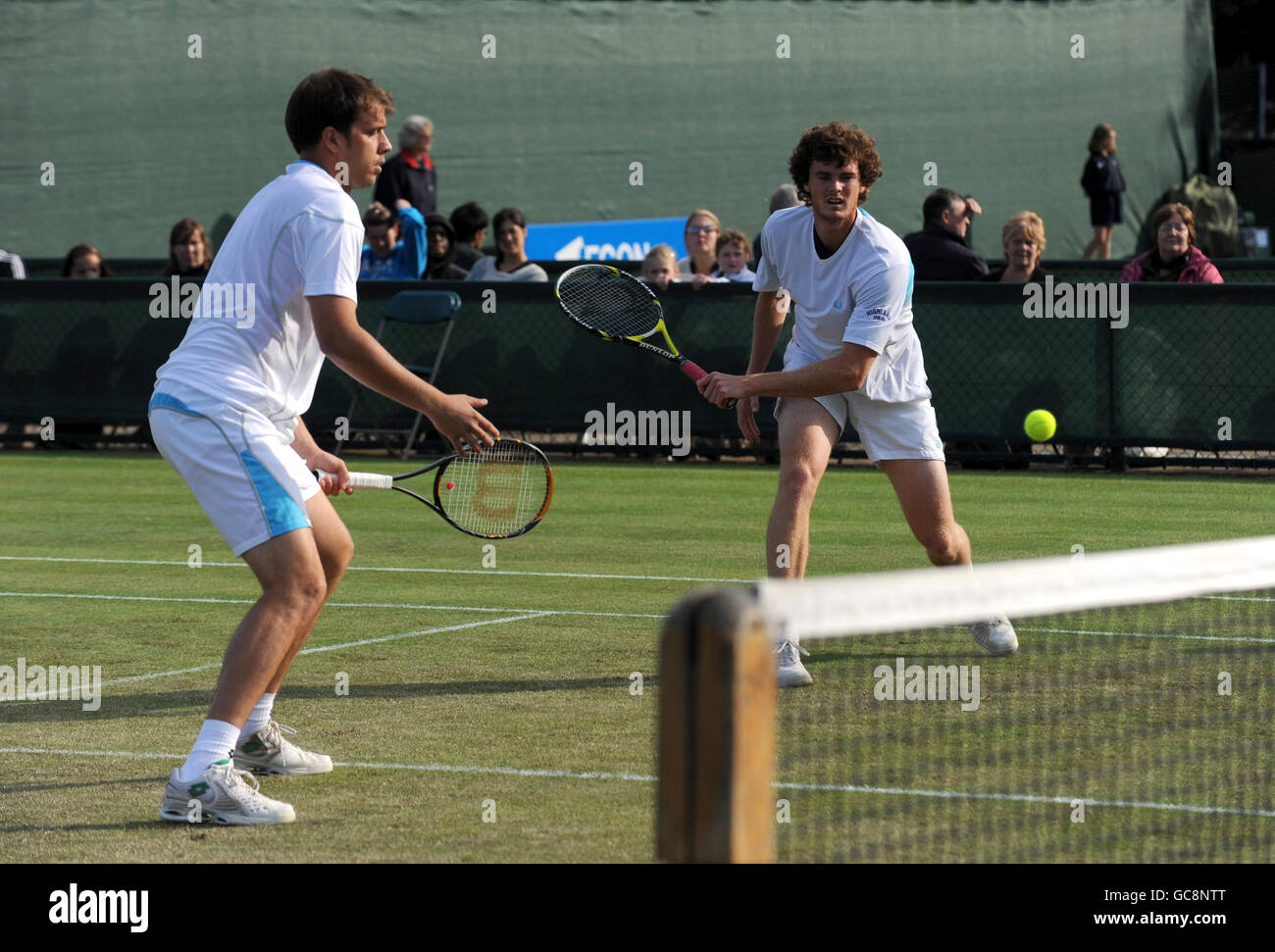 Great Britain's Jamie Murray (right) and doubles partner Luxembourg's Gilles Muller in action during their match against USA's Robert Kendrick and Jesse Levine Stock Photo