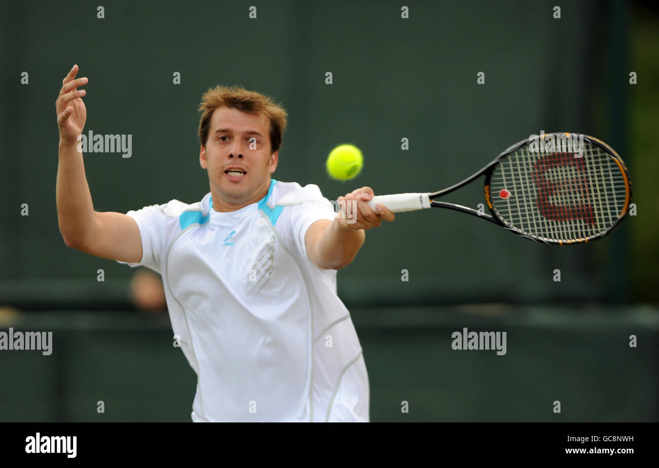 Luxembourg's Gilles Muller during his doubles match against USA's Robert Kendrick and Jesse Levine Stock Photo