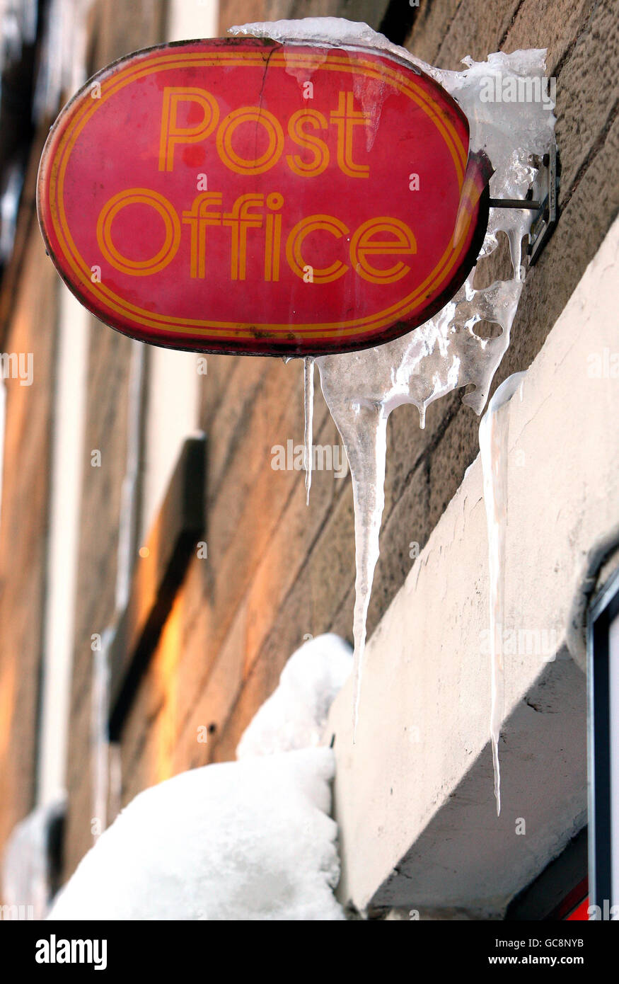 Icicles form on a post office sign in longridge hires stock