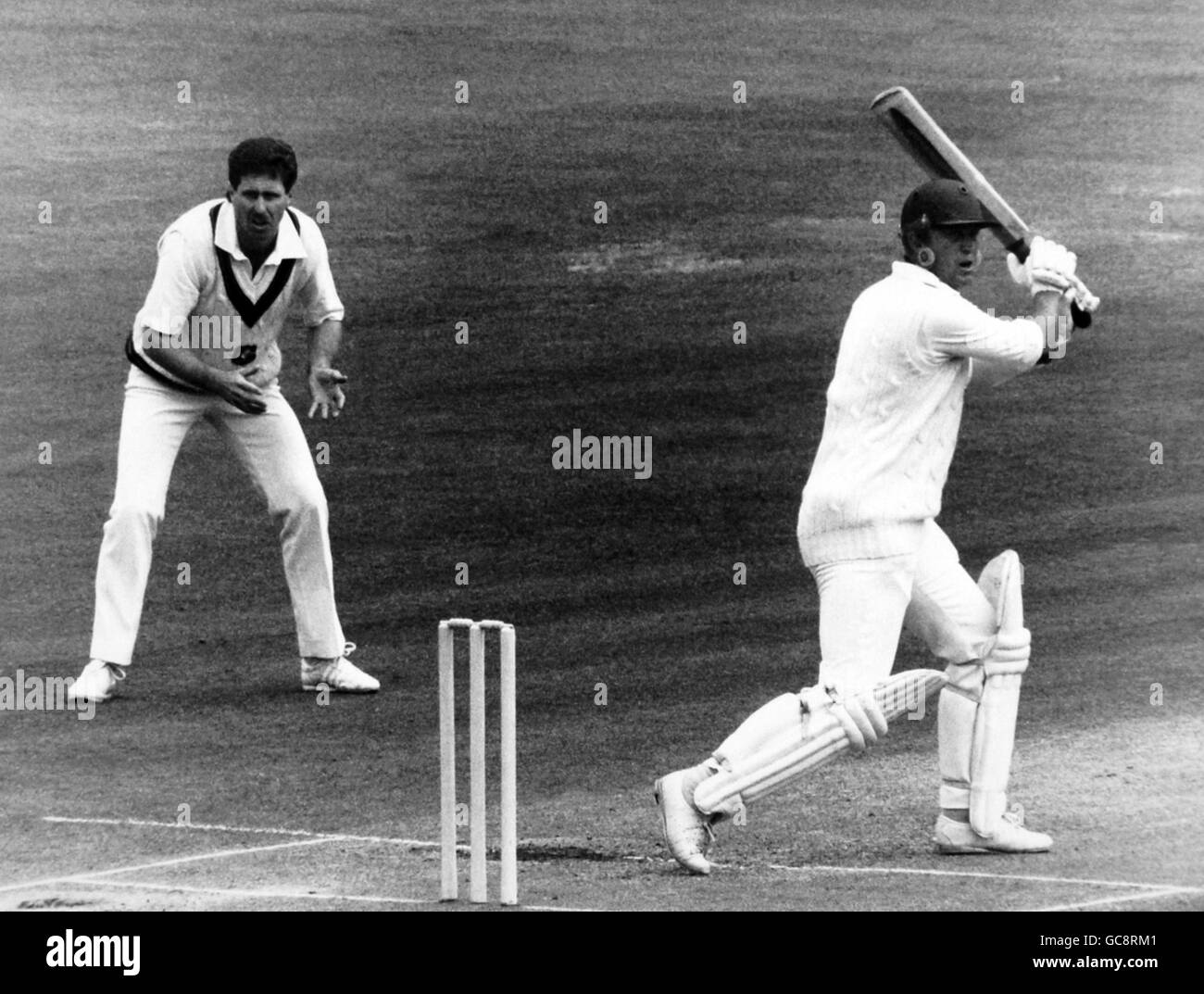 England batsman phil edmonds cuts ball watched by fielder wood hires