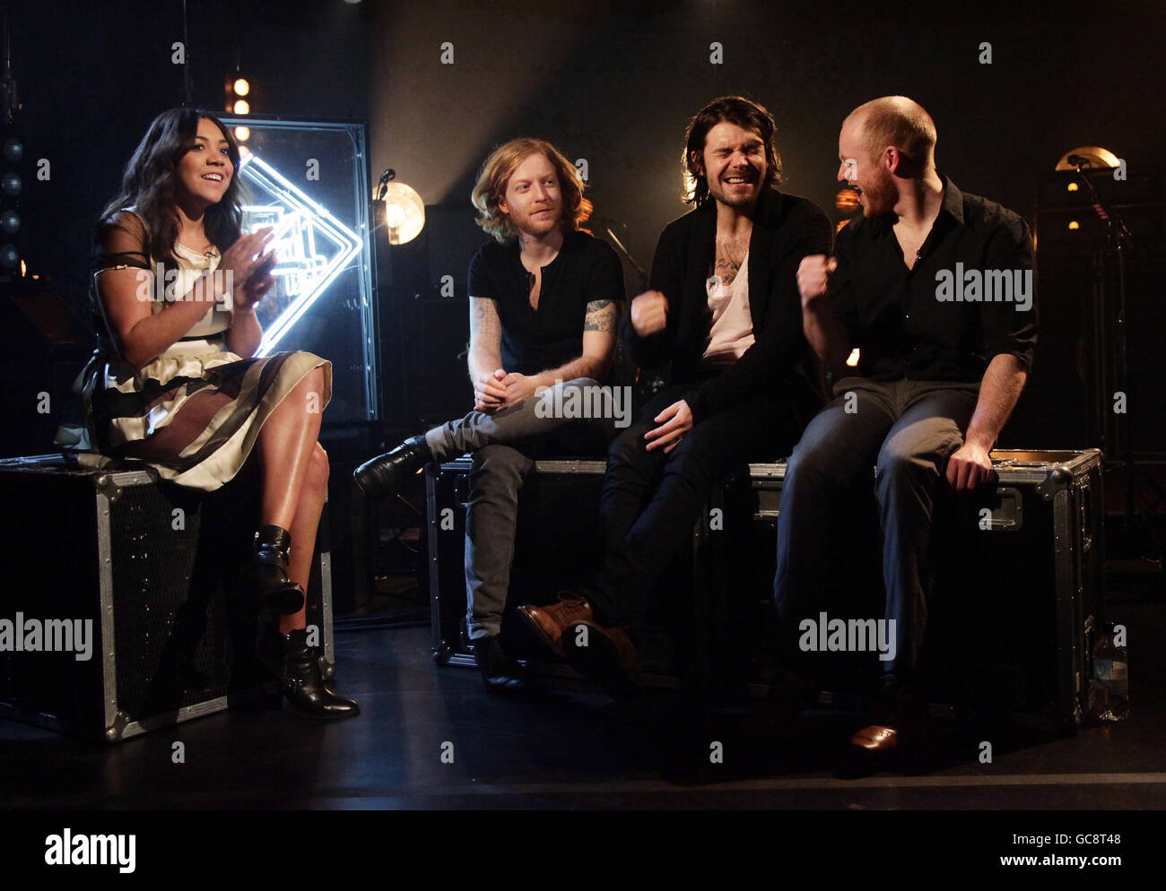Television presenter Miquita Oliver chats with Biffy Clyro (left to
