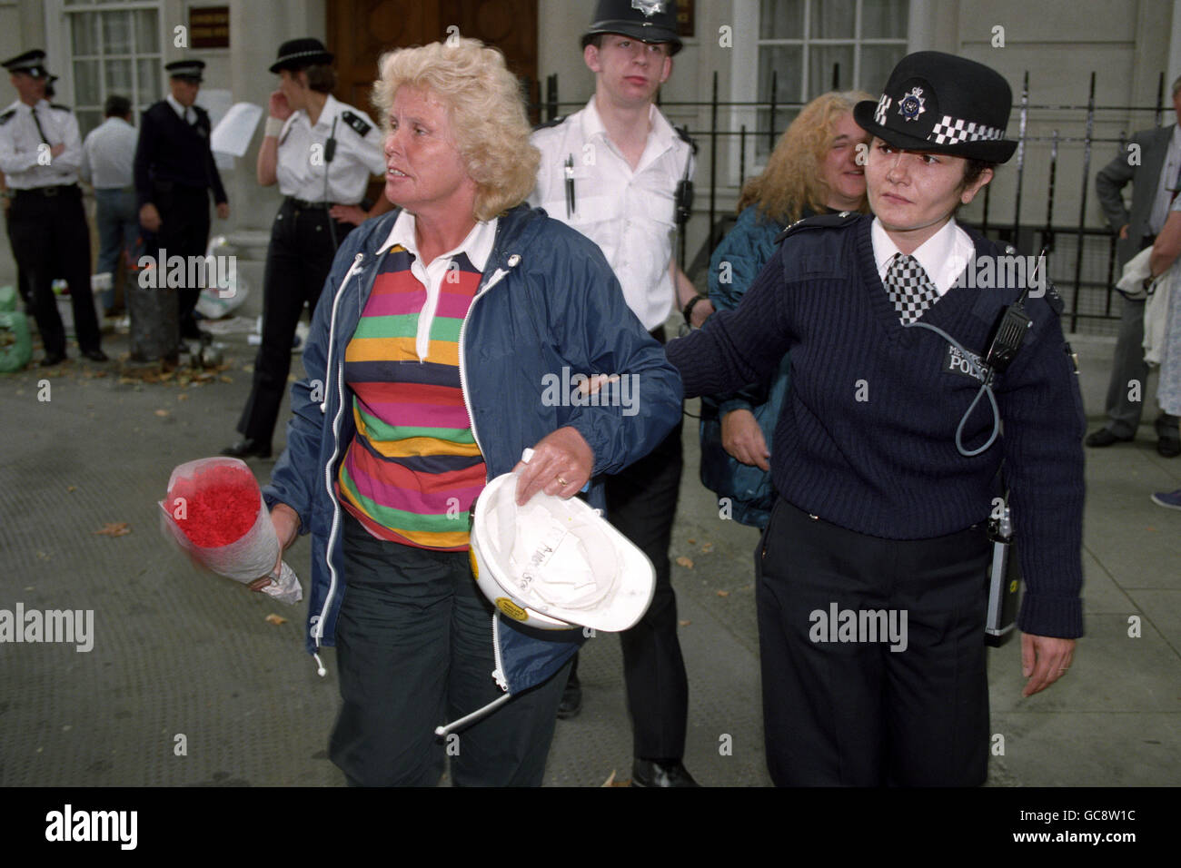 Mrs Anne Scargill, wife of miners leader Arthur Scargill, is led away ...