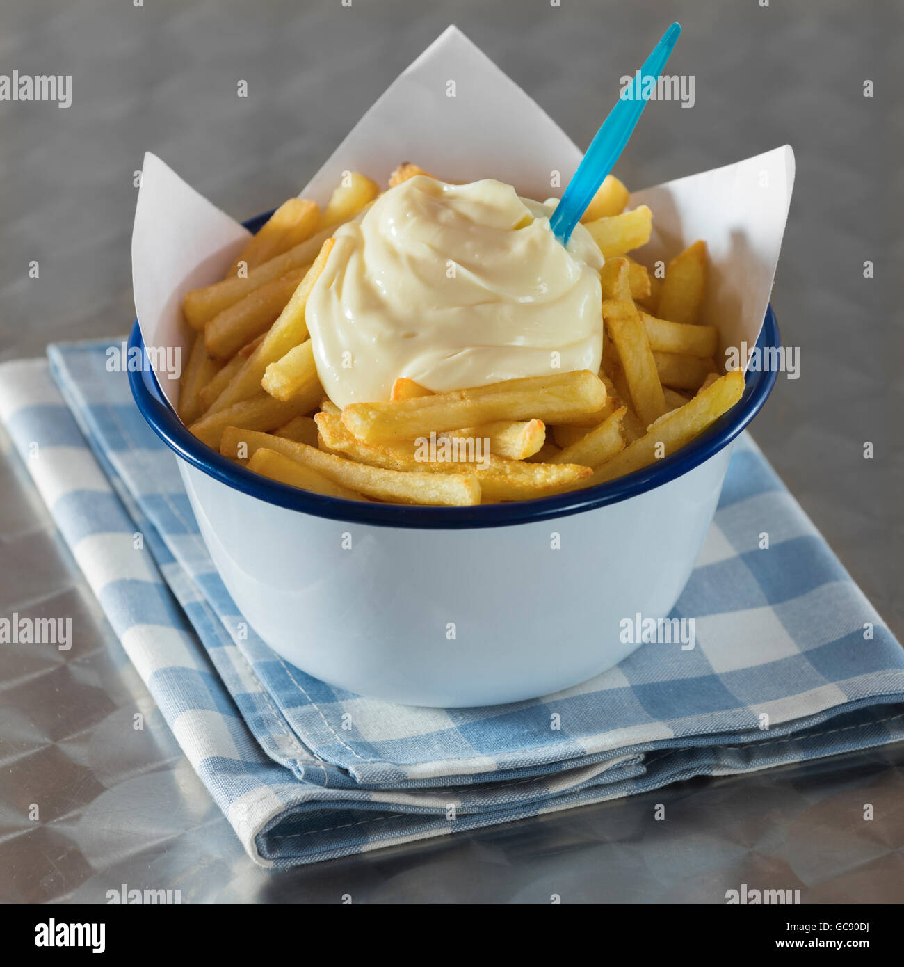 Chips with mayonnaise. Frietjes met mayonaise Stock Photo