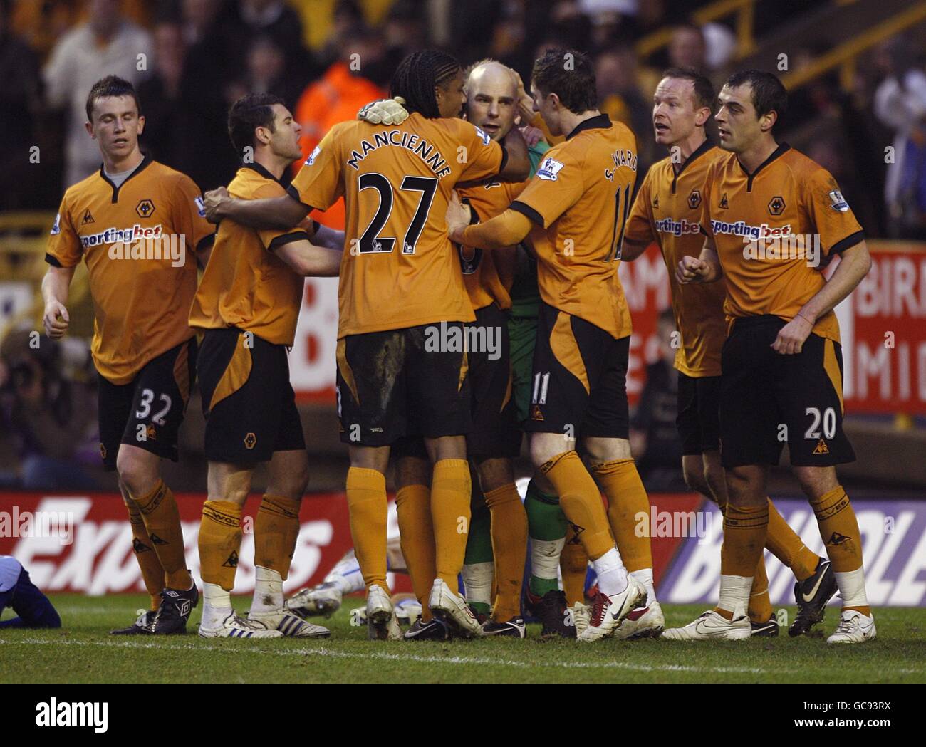 Wolverhampton Wanderers goalkeeper Marcus Hahnemann (centre) celebrates with his team mates after saving a shot on goal shortly after a penalty. Stock Photo