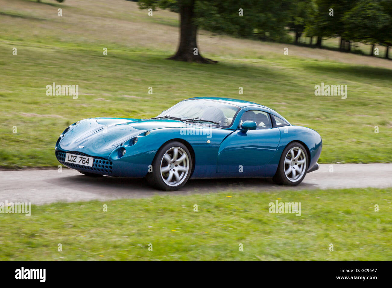 2000 blue TVR Tuscan sports car at Classic Car Rally Organised by Mark Woodward Classic Events, this is just one of 12 shows held at different locations around the country and features over 400 classic cars, and restored vehicles. Stock Photo