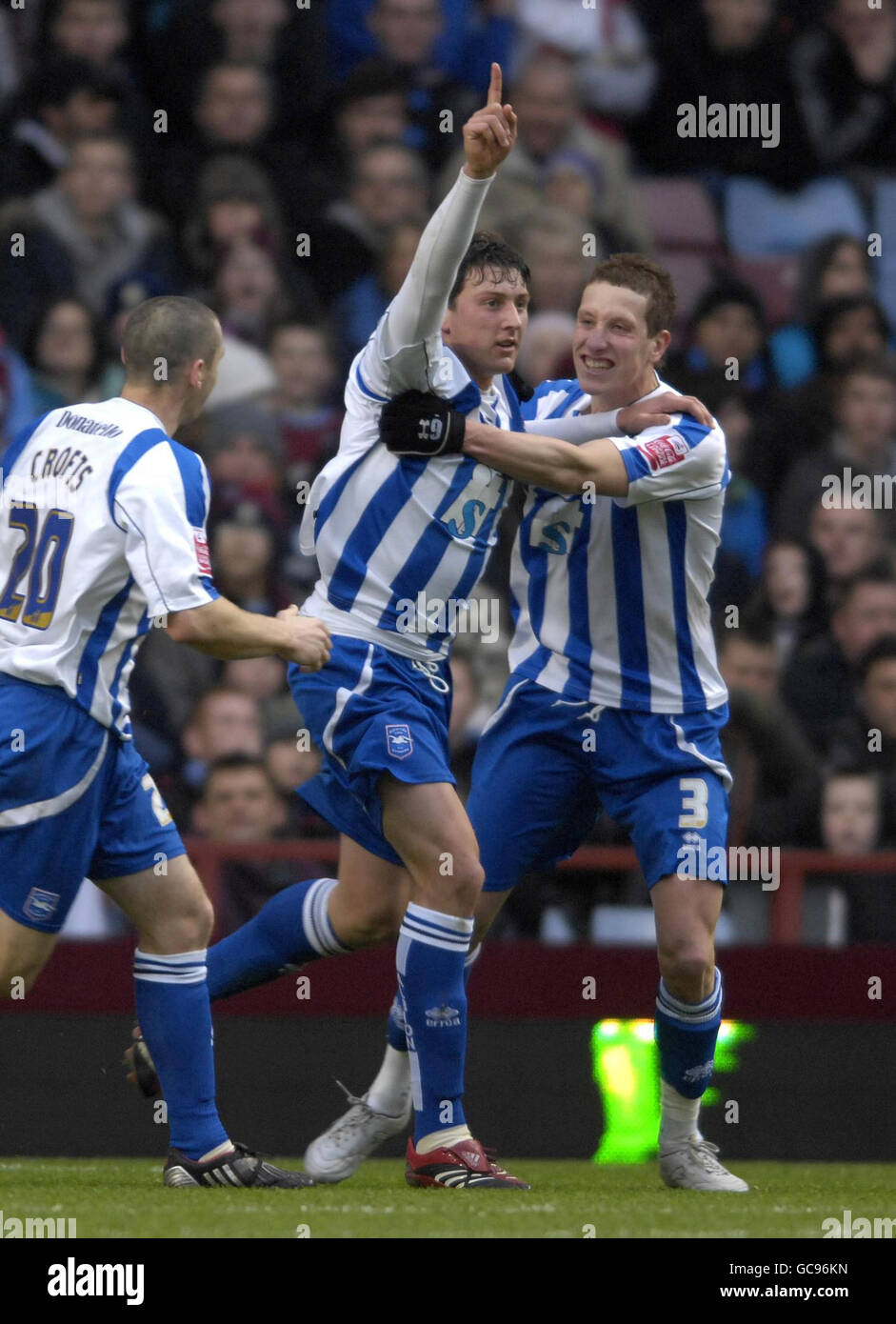Brighton and Hove Albion's Tommy Elphick(centre) celebrates after scoring their first and equalising goal during the FA Cup Fouth Round match at Villa Park, Birmingham. Stock Photo