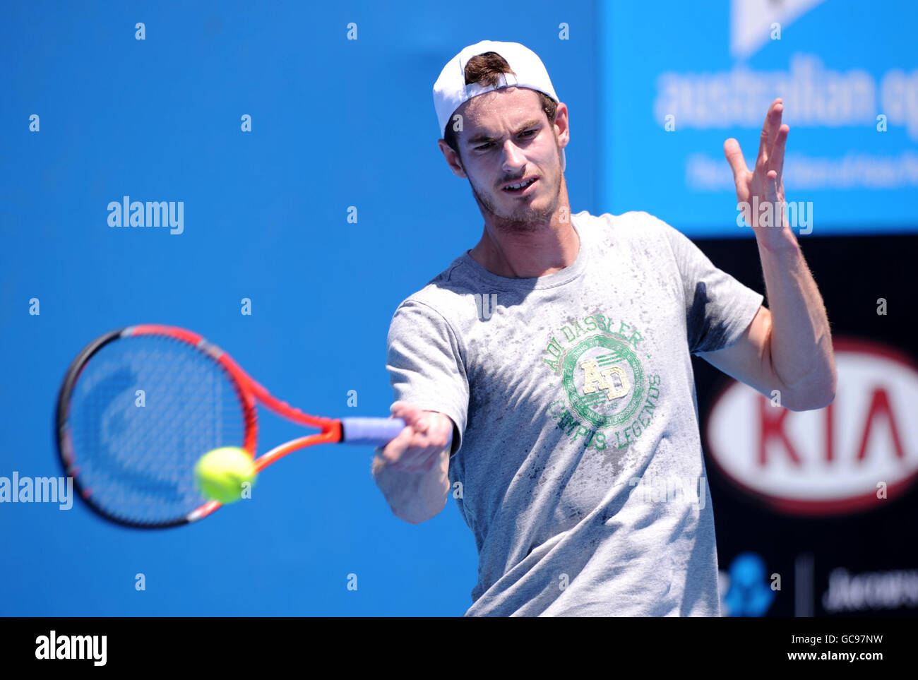 Great Britain's Andy Murray trains on an outside court prior to his match against France's Florent Serra at the Australian Open Stock Photo