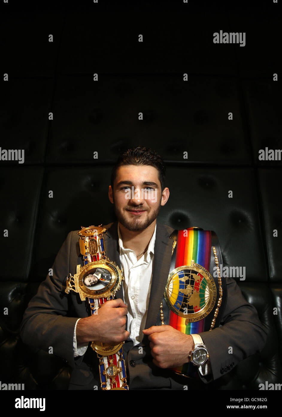 British boxer Nathan Cleverly with his British Light-Heavyweight and Commonwealth belts during the press conference at The Little Italy, London. Stock Photo