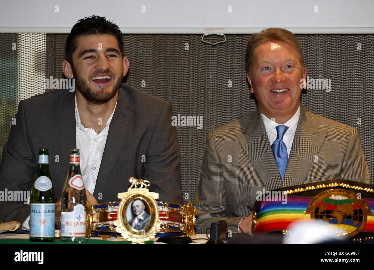 Promoter Frank Warren (right) with his boxer Nathan Cleverly as they talk to the media during the press conference at The Little Italy, London. Stock Photo
