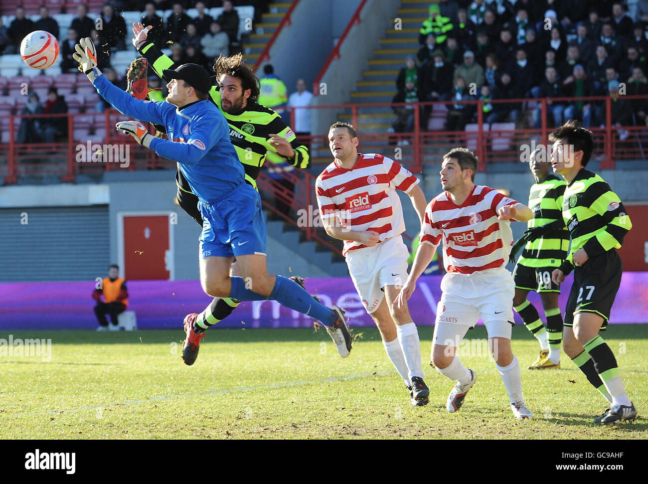 Hamilton's Tomas Cerny saves from Celtic's Georgios Samaras during the Clydesdale Bank Premier League match at New Douglas Park, Hamilton, Scotland. Stock Photo