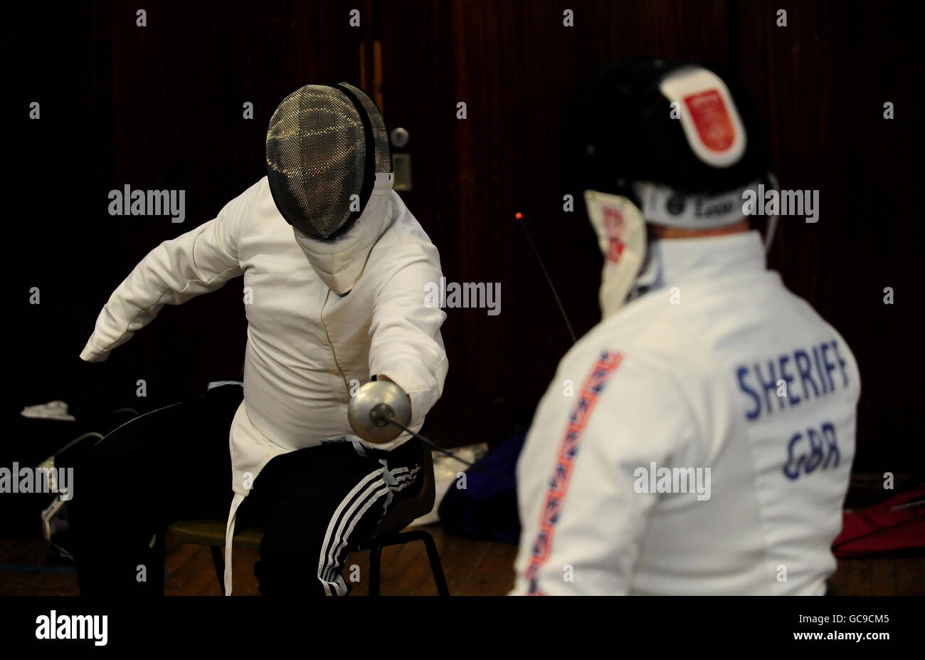 Press Association Journalist Alex Brooker (left) takes part in the Fencing event of the ParalympicsGB London 2012 talent assessment day at the Munrow Sports Centre at the University of Birmingham. Stock Photo