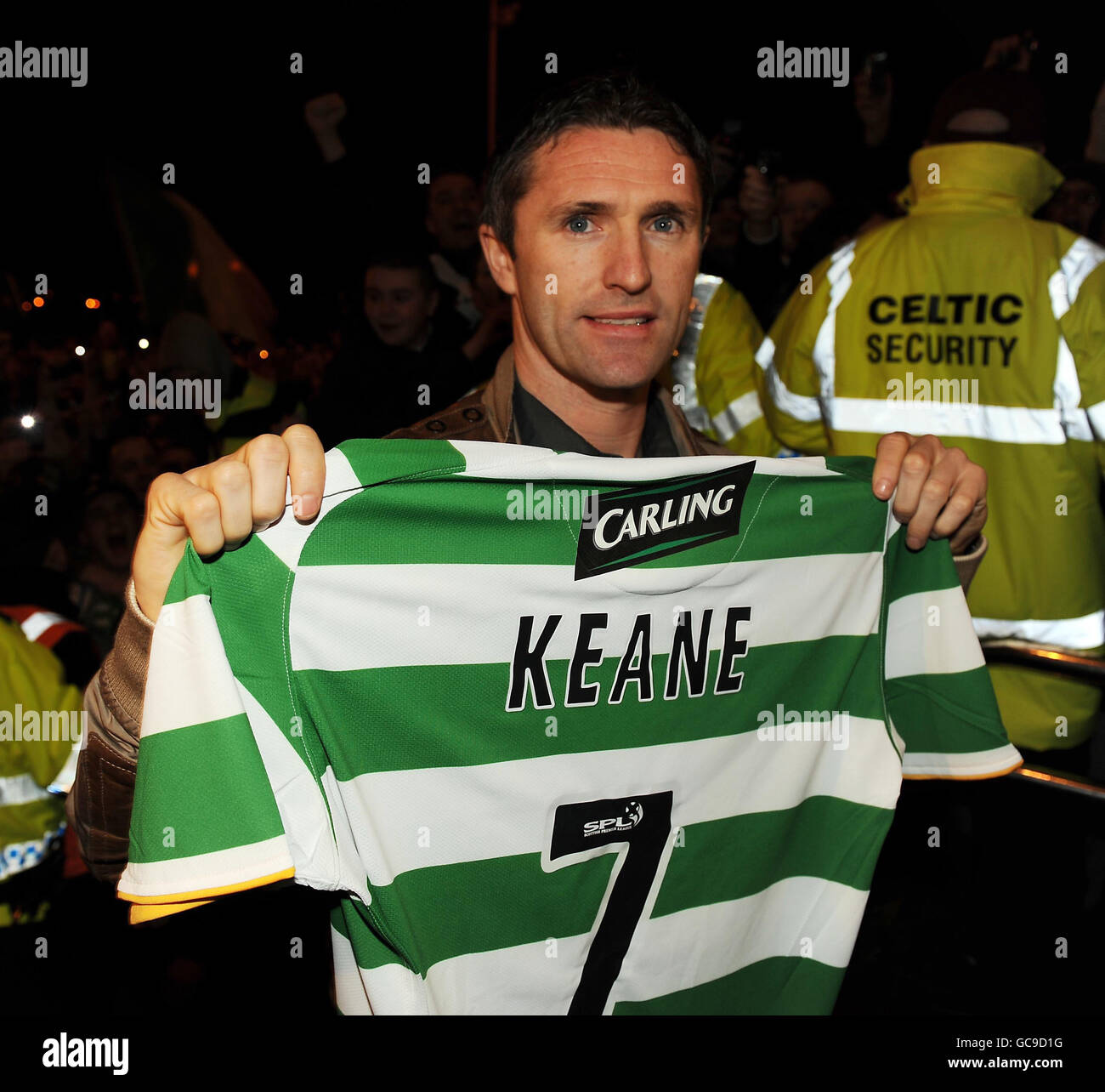 Celtic s New Signing Robbie Keane With His Shirt As He Greets Waiting celtic-s-new-signing-robbie-keane-with-his-shirt-as-he-greets-waiting
