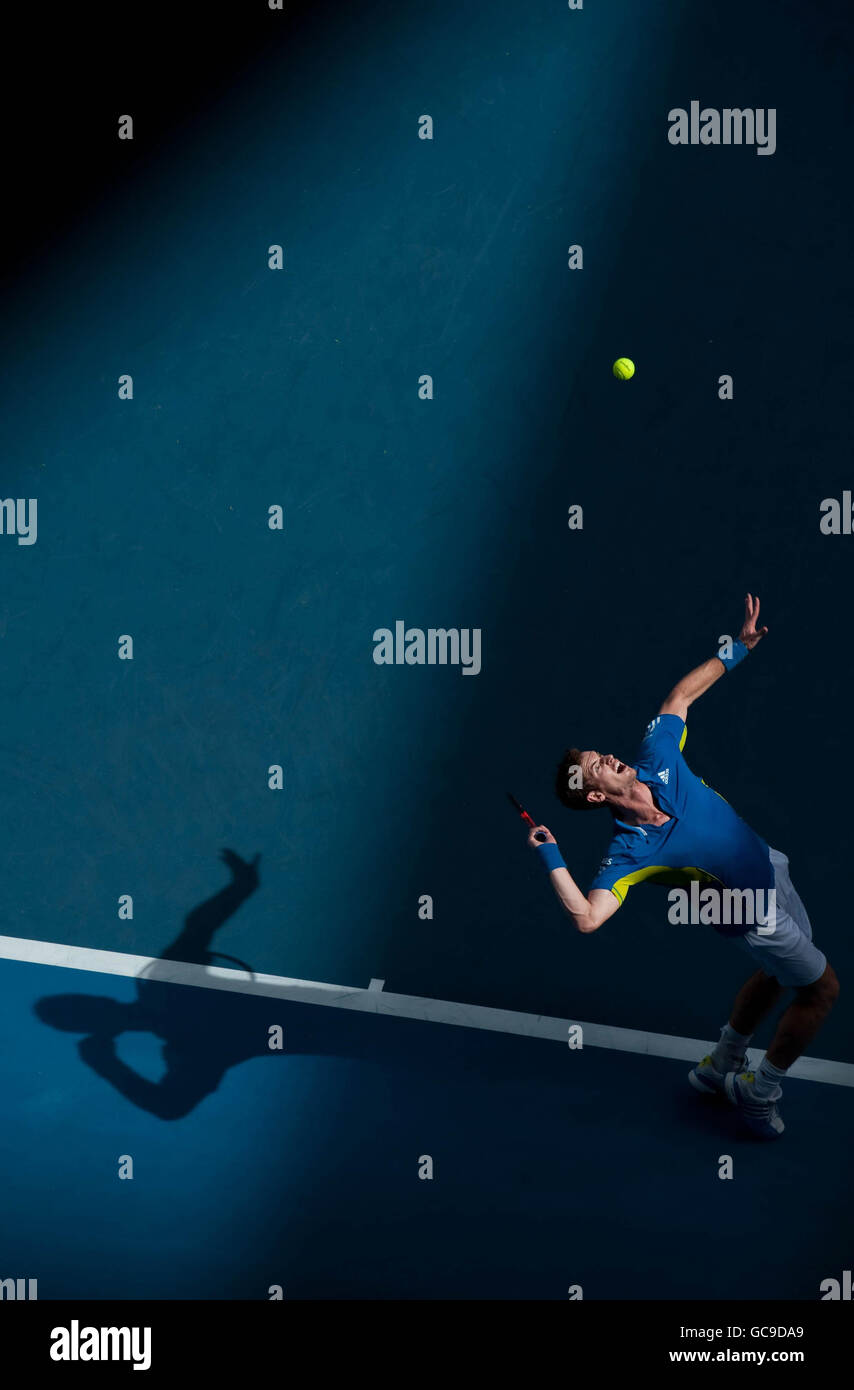 Great Britain's Andy Murray in action against France's Florent Serra during day five of the 2010 Australian Open at Melbourne Park, Melbourne, Australia. Stock Photo