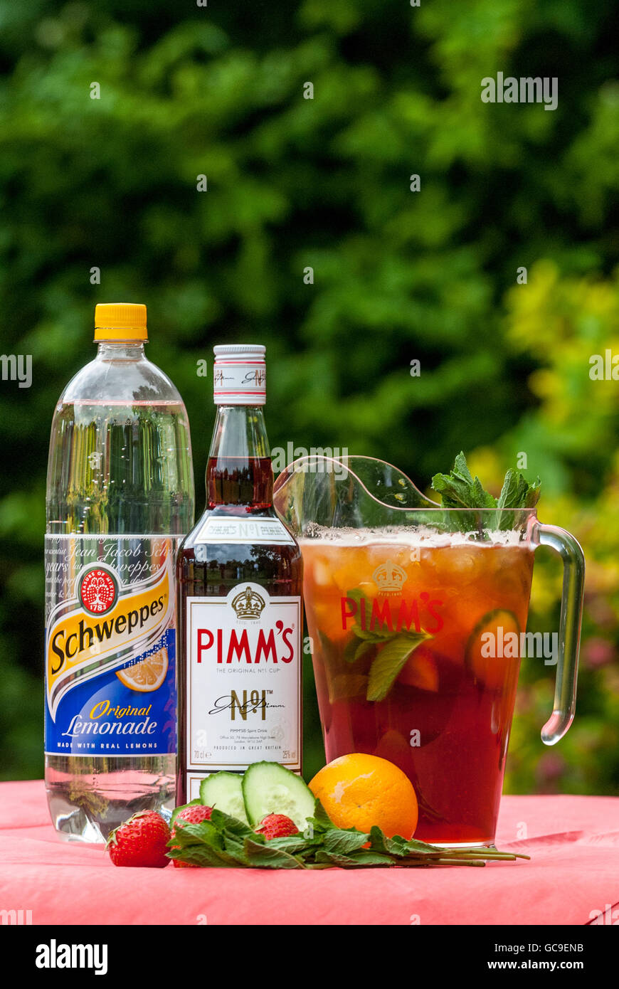 The classic drink Pimms and a selection of summer mixers Stock Photo