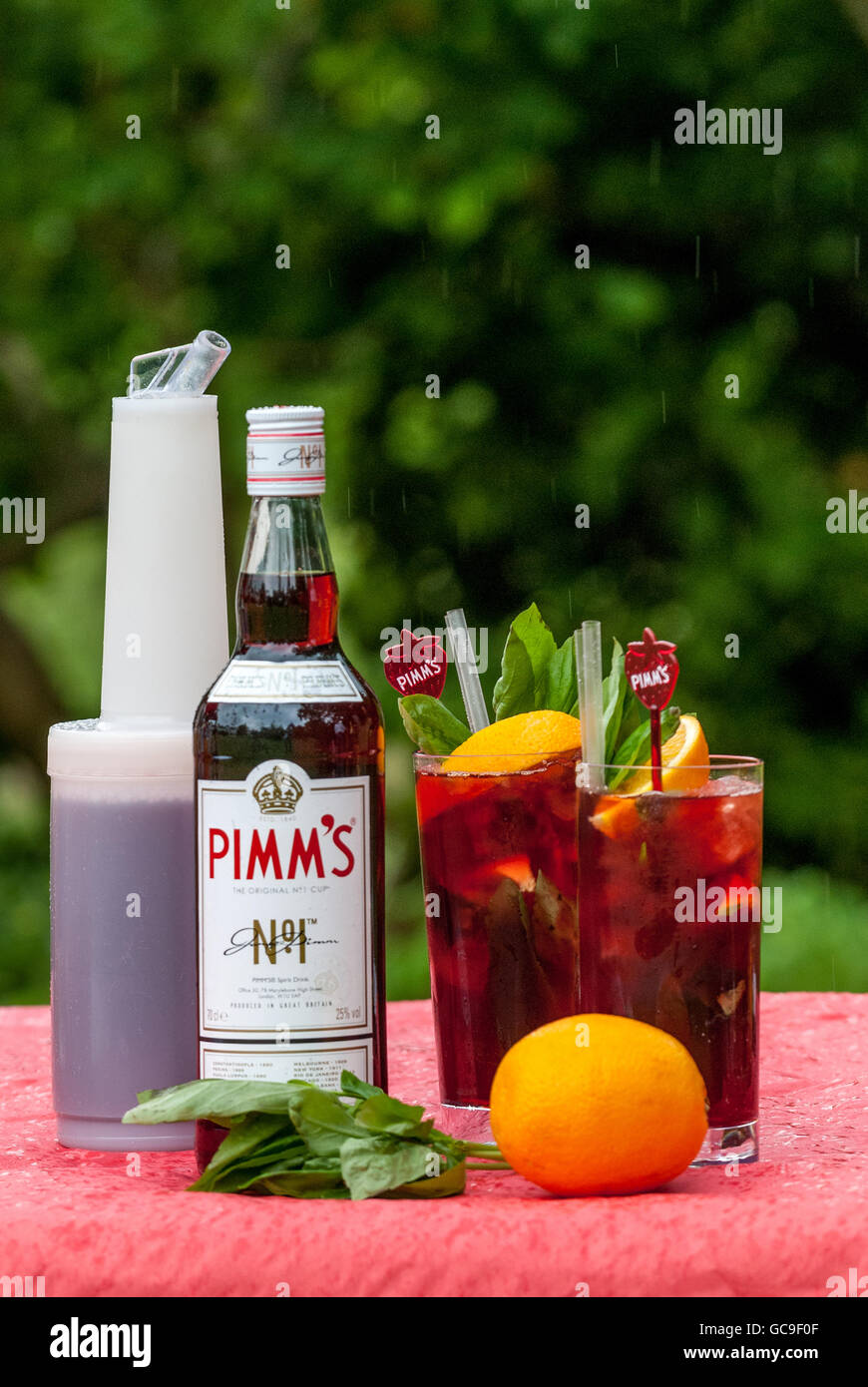 The classic drink Pimms and a selection of summer mixers Stock Photo