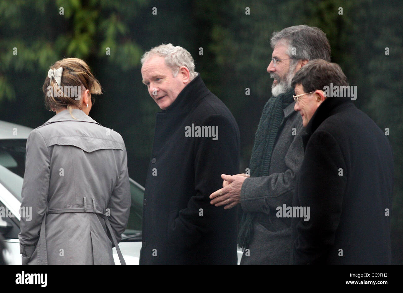 (Left - right) Martina Anderson, deputy First Minister of Northern Ireland Martin McGuinness, Sinn Fein President Gerry Adams and Pat Doherty in the grounds of Hillsborough Castle. Talks are being held in an attempt to find agreement between Sinn Fein and the DUP on the devolution of policing and justice powers to Stormont. Stock Photo