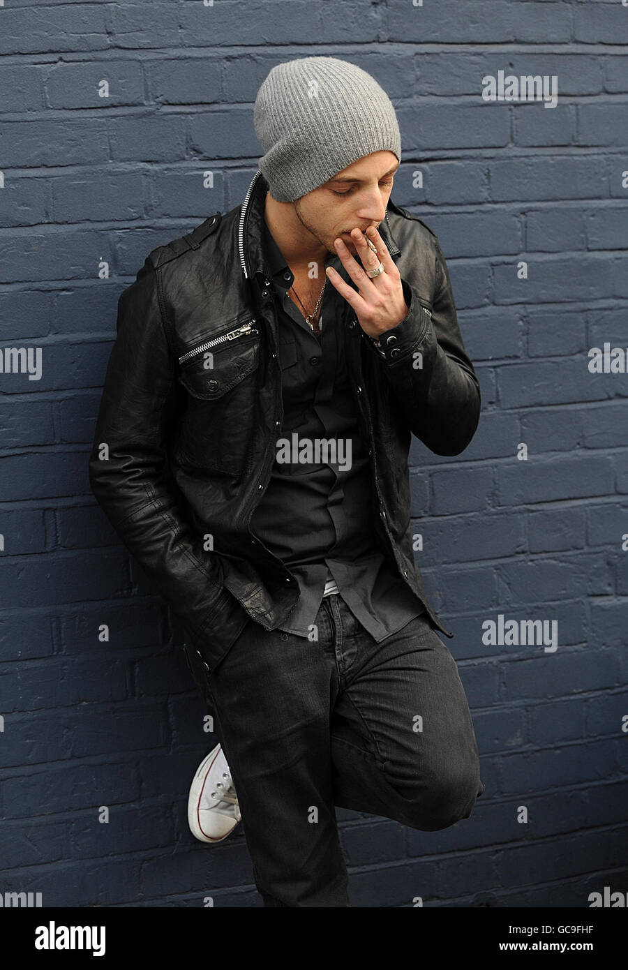 Singer James Morrison smokes a cigarette outside SARM Studios in Notting  Hill where a re-recording is being made of the REM song Everybody Hurts to  raise funds for the Haiti earthquake Stock