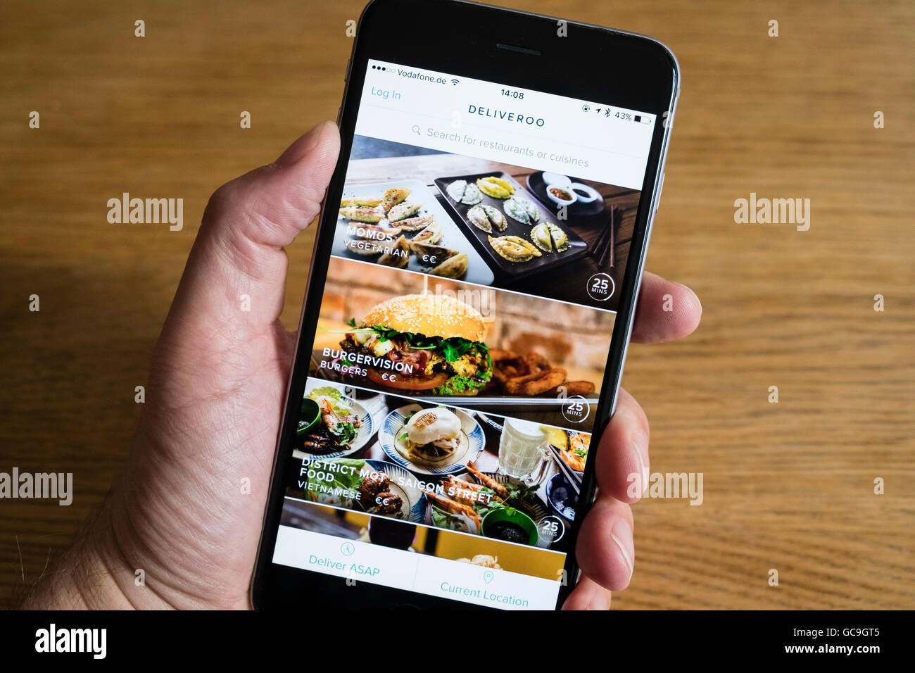 Deiveroo app restaurant food delivery service on an iPhone 6 smart phone Stock Photo
