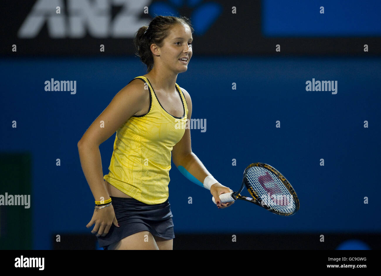 Great Britain's Laura Robson is all smiles during her doubles match with Sally Peers against Maria Kirilenko and Agnieszka Radwanska during The Australian Open at Melbourne Park, Melbourne. Stock Photo