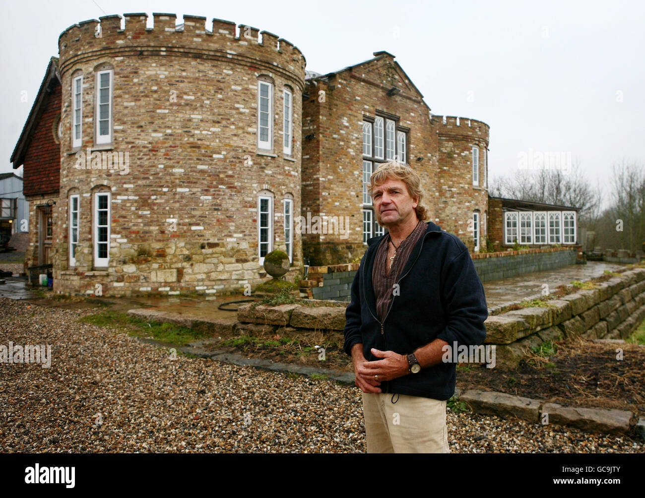 Robert Fidler outside his home he built in Salfords near Redhill, Surrey, which may have to be demolished after a High Court ruling today. Stock Photo