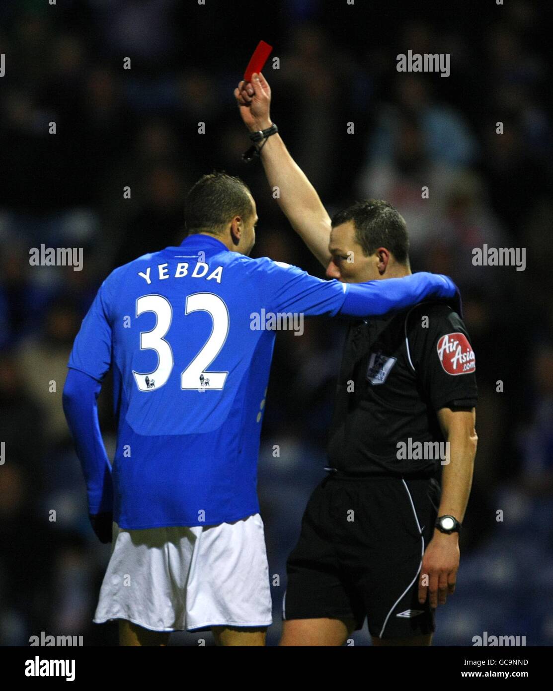 Portsmouth's Hassan Yebda (left) protests his innocence after he is shown the red card by referee Kevin Friend Stock Photo