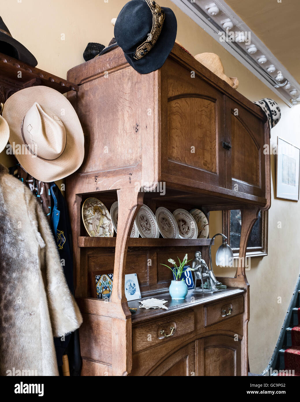 Antique wooden cabinet in Nottinghill hallway, London, UK Stock Photo
