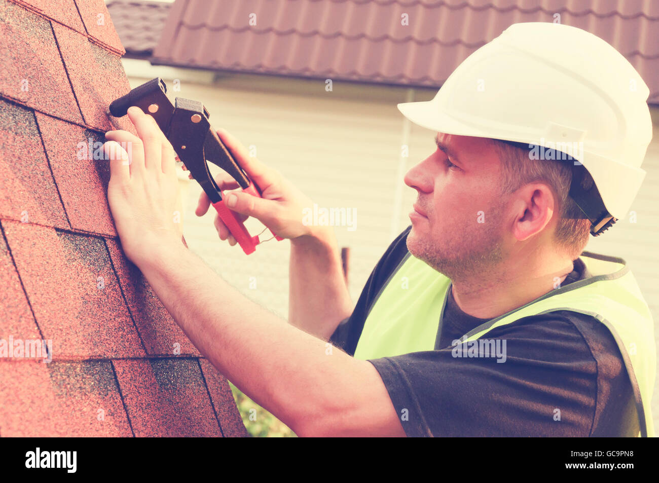 Roofer slate roof shingles hires stock photography and images Alamy