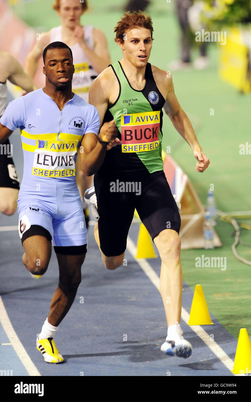 Richard Buck (right) who went on to win the Mens 400m finals clashes with Nigel levine who finished second during the Aviva World Trials and UK Championships at the English Institute of Sport, Sheffield. Stock Photo
