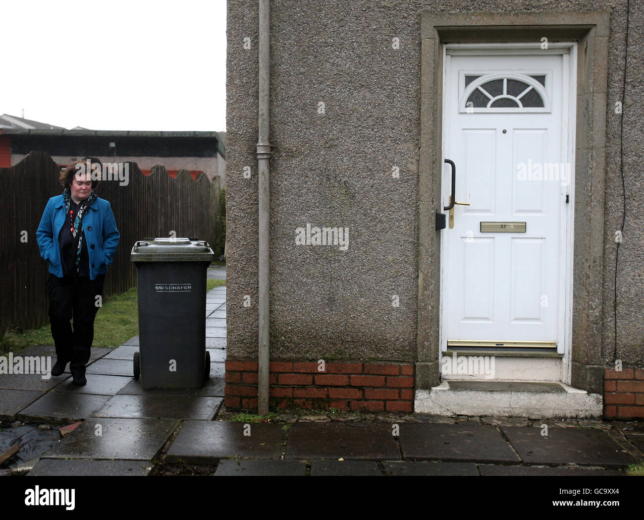 Susan Boyle outside her house in Blackburn, West Lothian. The singer