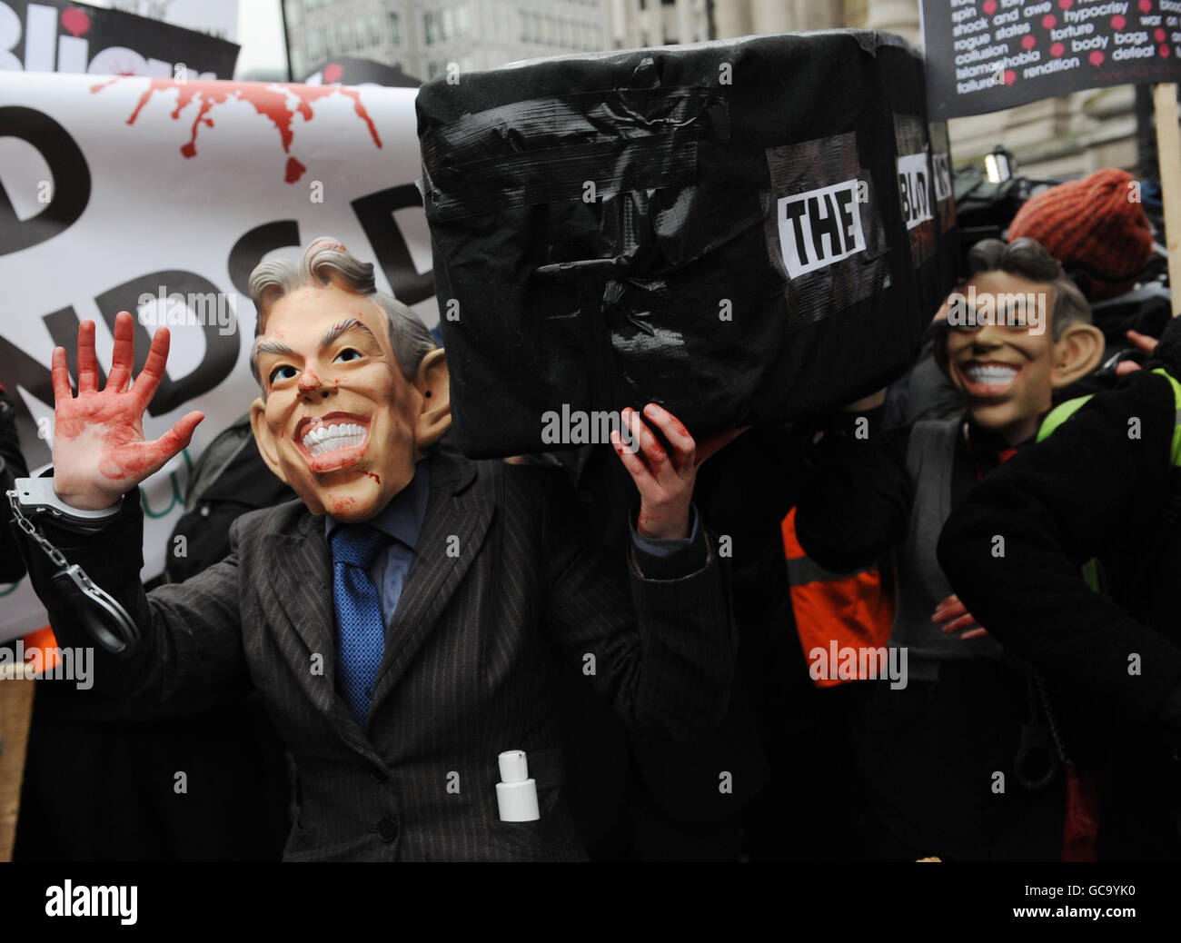 Demonstrators protest outside the Queen Elizabeth Conference Centre in London where former prime minister Tony Blair is due to give evidence to the Chilcott Inquiry. Mr Blair arrived early for his appearance at the Iraq Inquiry as he prepared to be questioned on why he took Britain to war. Stock Photo