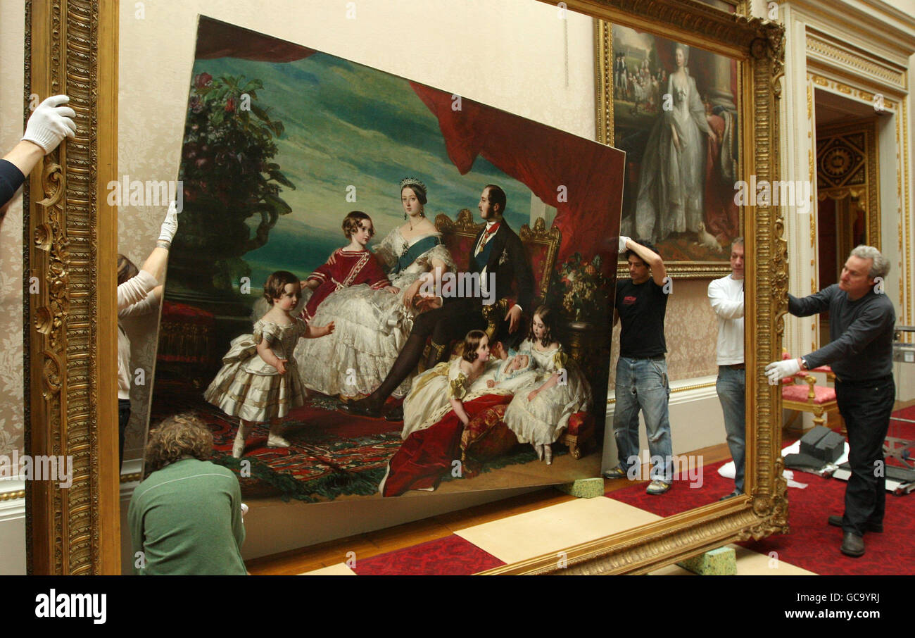 Conservators of the Royal Collection move 'The Royal Family in 1846' by Franz Xaver Winterhalter from the East Gallery of Buckingham Palace as part of the preparations for the forthcoming exhibition 'Victoria & Albert: Art & Love' which will be at The Queen's Gallery, Buckingham Palace from 19 March 2010. Stock Photo