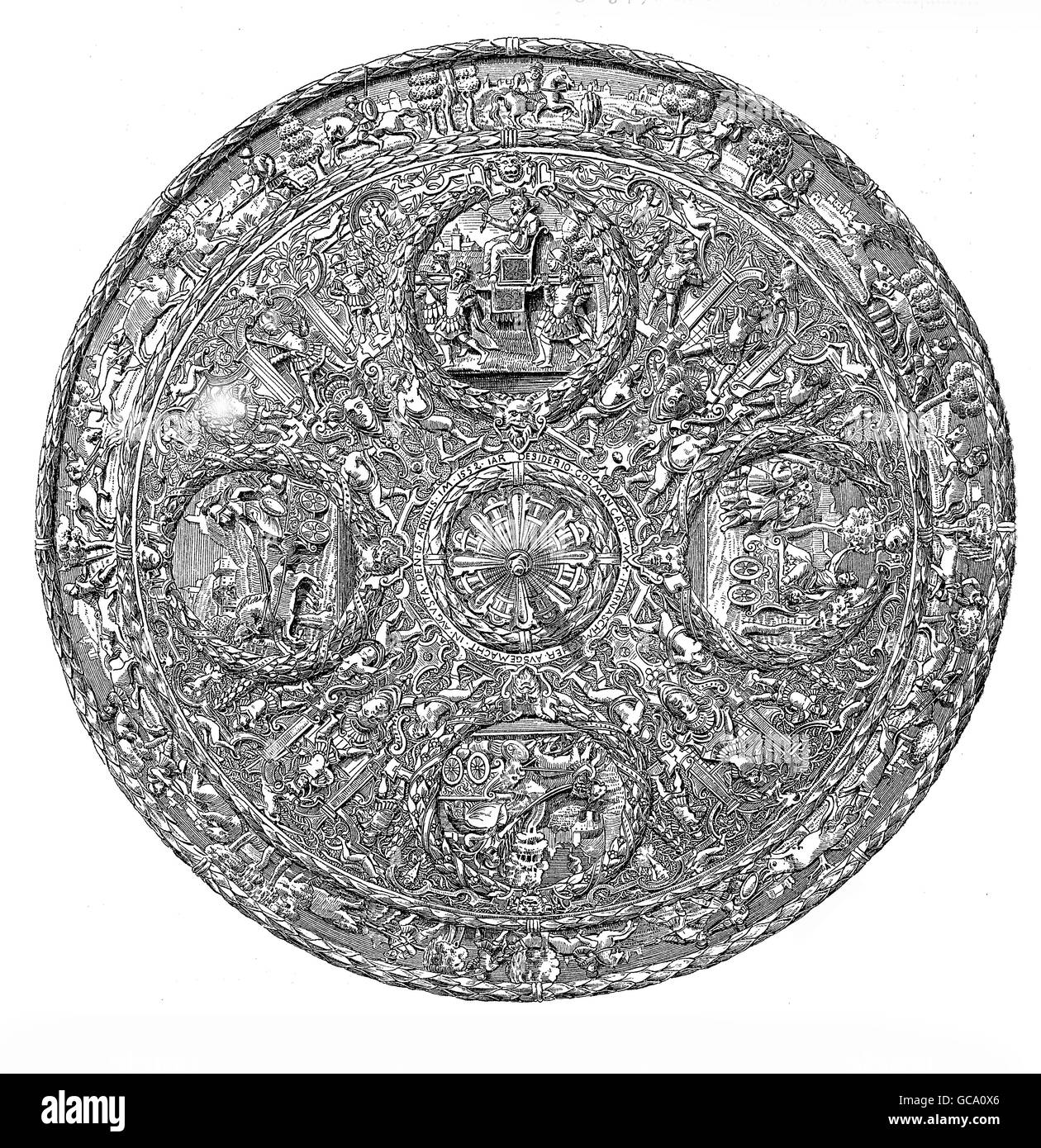 Renaissance round shield, embossed and chiseled iron with mythological decorations Stock Photo