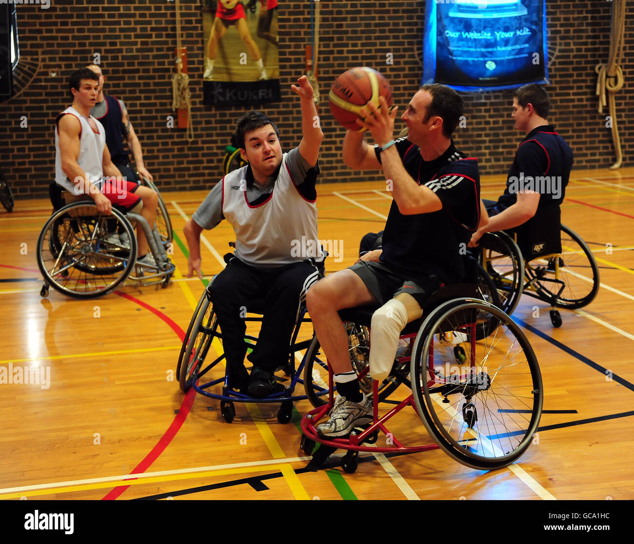 Press Association Journalist Alex Brooker (2nd left) takes part in the Basketball part of the ParalympicsGB London 2012 talent assessment day at the Munrow Sports Centre at the University of Birmingham Stock Photo